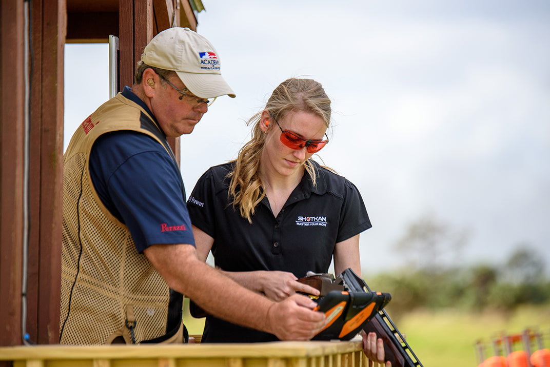 Australian instructor and student working with ShotKam to solve the problem of interpreting lead in clay shooting.
