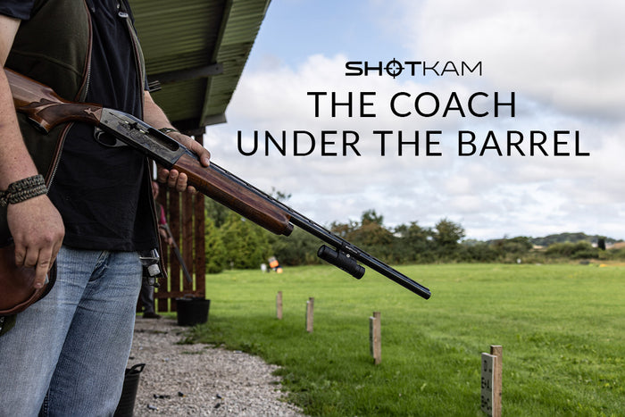 Improving trapshooting in Australia: Shooter with a ShotKam-attached shotgun, focusing on the role of a coach under the barrel.