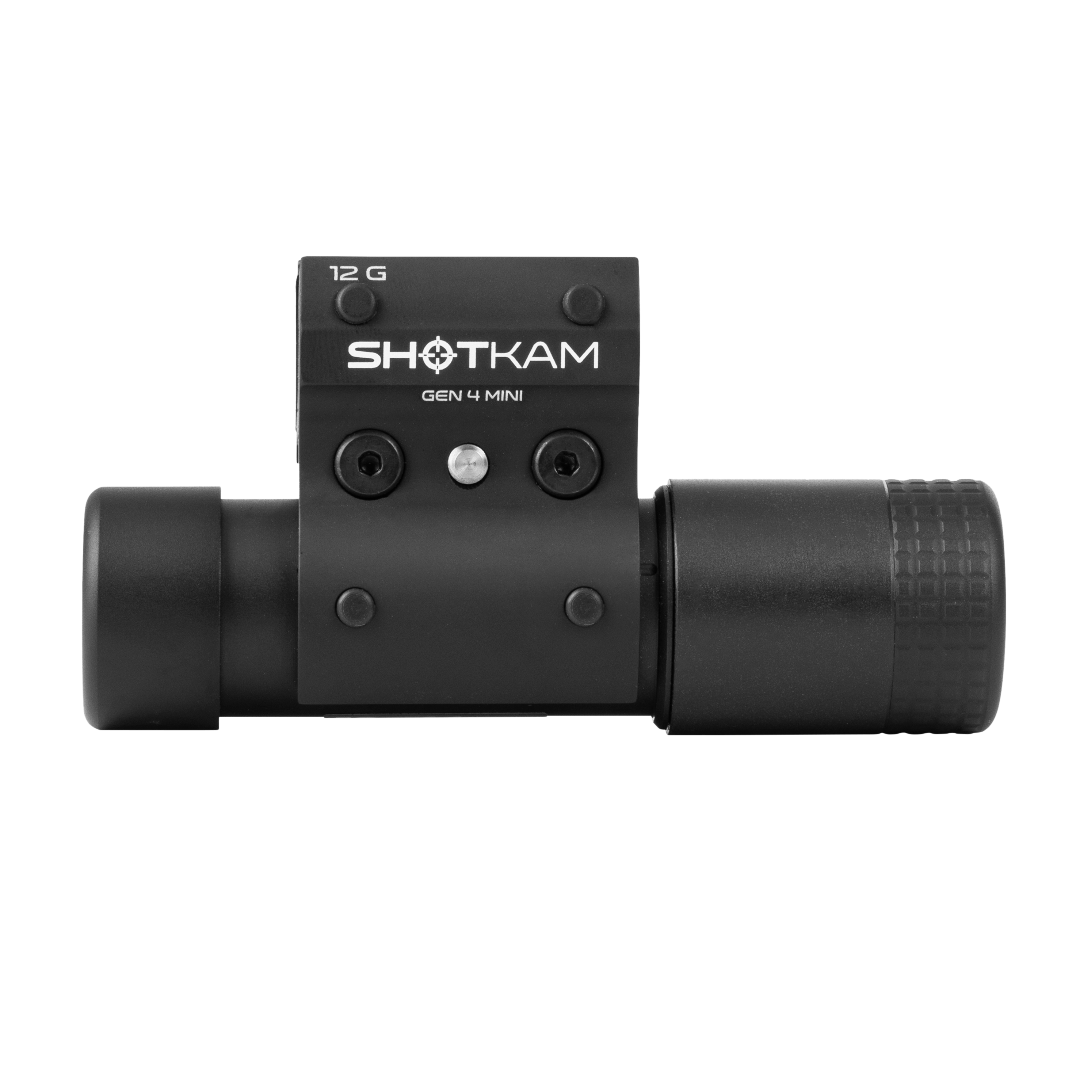 Front view of the ShotKam Gen 4 Mini camera, highlighting the lens and mounting bracket against a plain background.