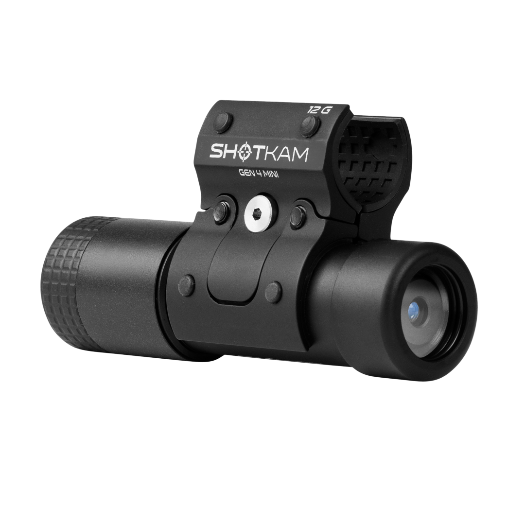 ShotKam Gen 4 Mini camera with a black finish, featuring a prominent lens and a mounting bracket for a 12-gauge barrel.