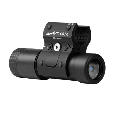 ShotKam Gen 4 Mini camera with a black finish, featuring a prominent lens and a mounting bracket for a 12-gauge barrel.